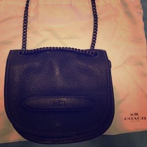 Coach. Timeless pebbled leather cross body bag